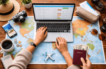 Top Travel Hacks (Packing, Flights, Money Saving) Traveler planning international trip using laptop and world map