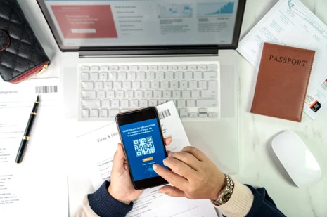 Complete Guide to Tourist Visa Traveler preparing tourist visa documents with passport and flight tickets